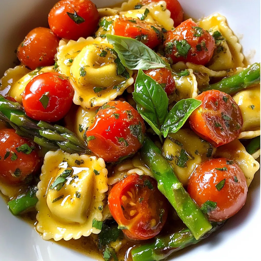 A bowl of pasta with tomatoes and asparagus.