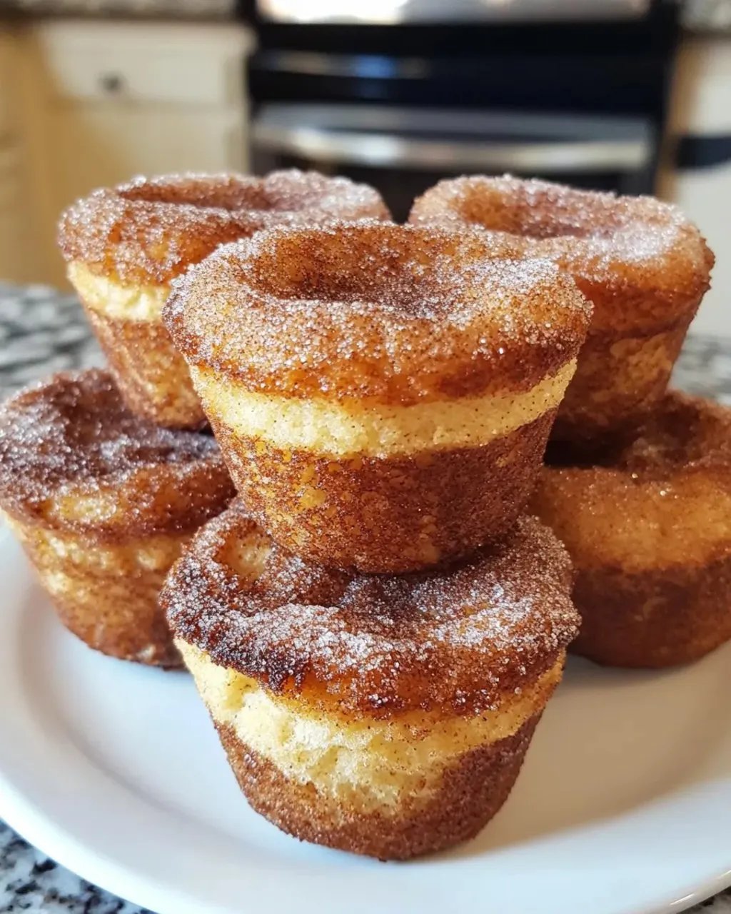 A stack of cinnamon sugar french toast muffins.
