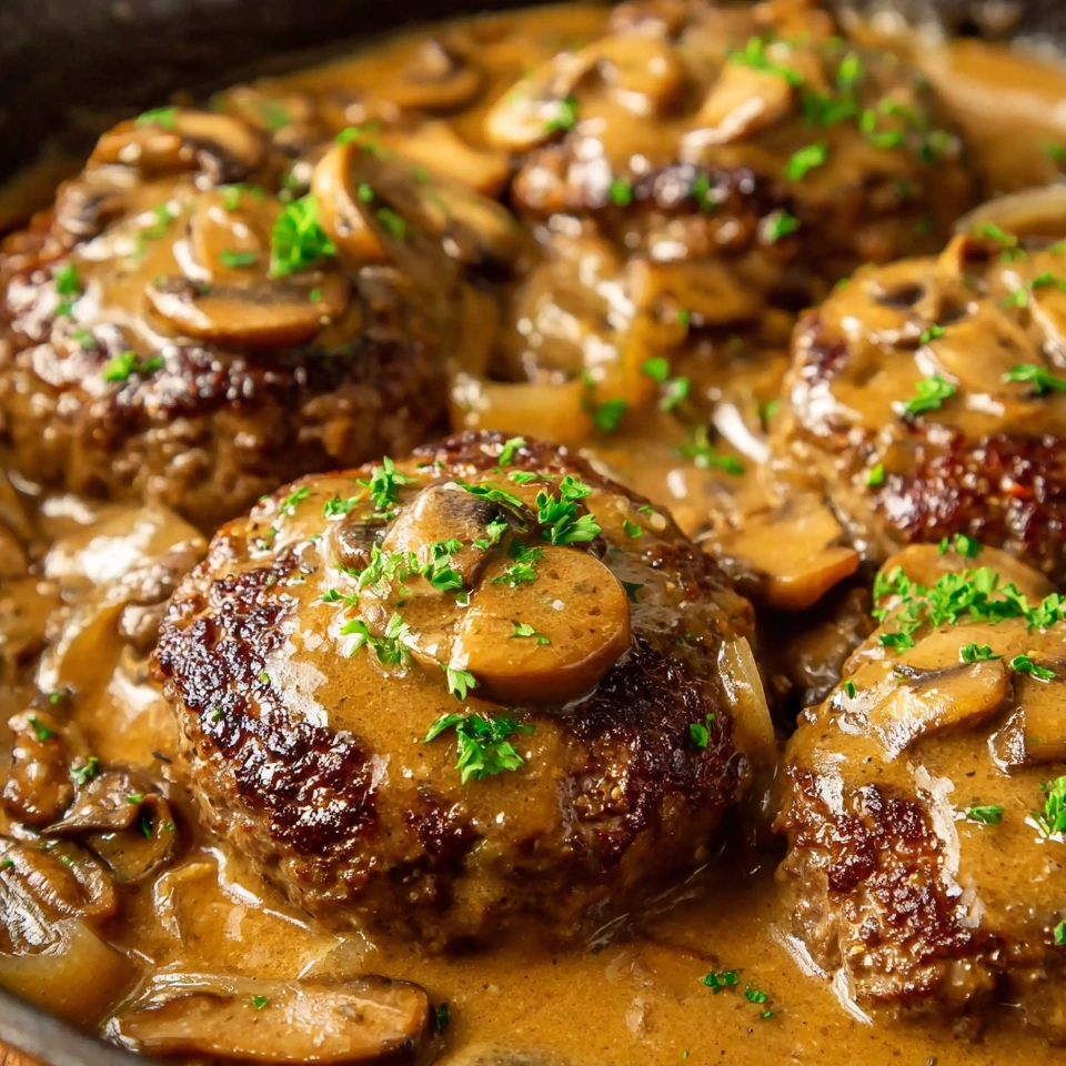Hamburger steaks smothered in a rich sauce.