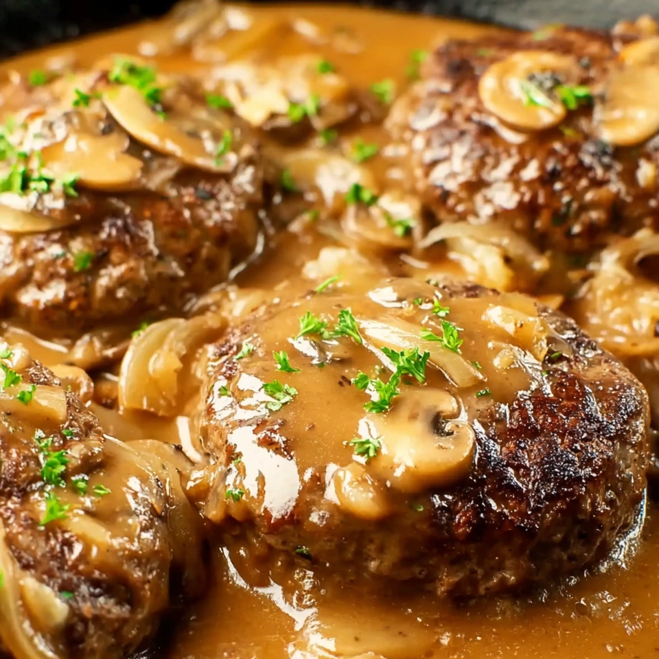 Hamburger steaks smothered in gravy.