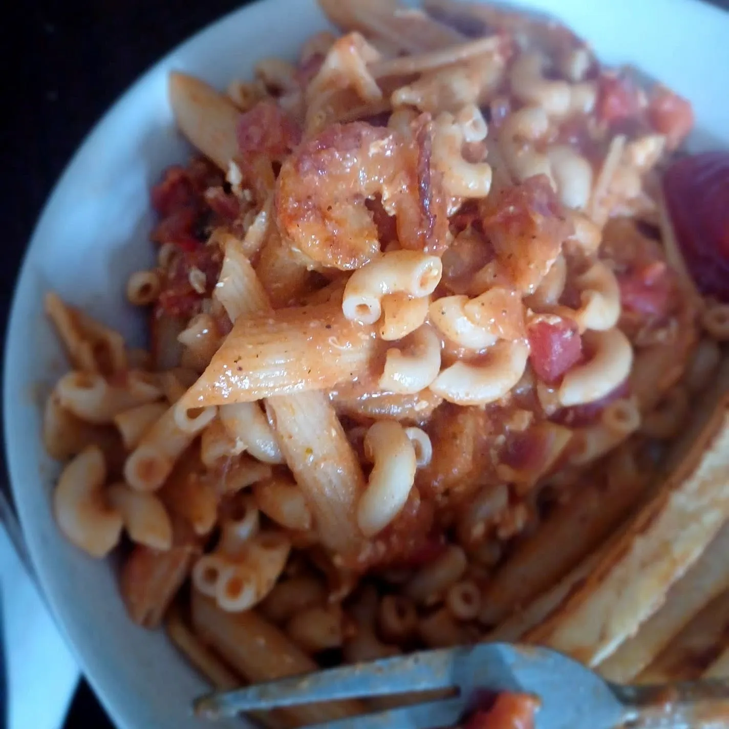 A plate of spicy garlic shrimp pasta.