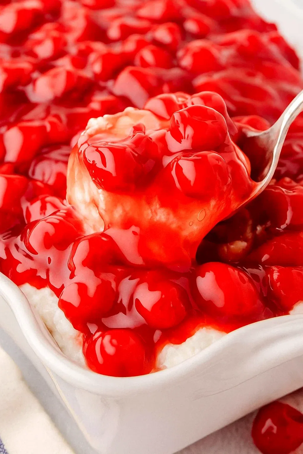 A spoonful of cherries in the snow.