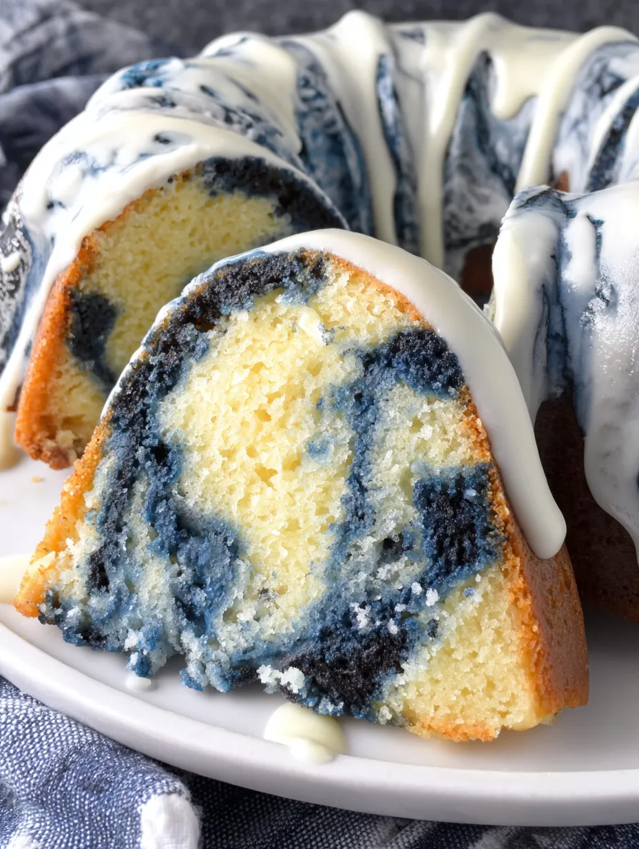 A slice of blue velvet swirl vanilla pound cake.