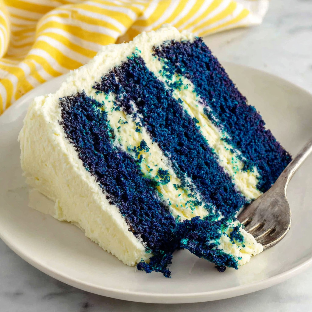 A slice of blue velvet vanilla pound cake.