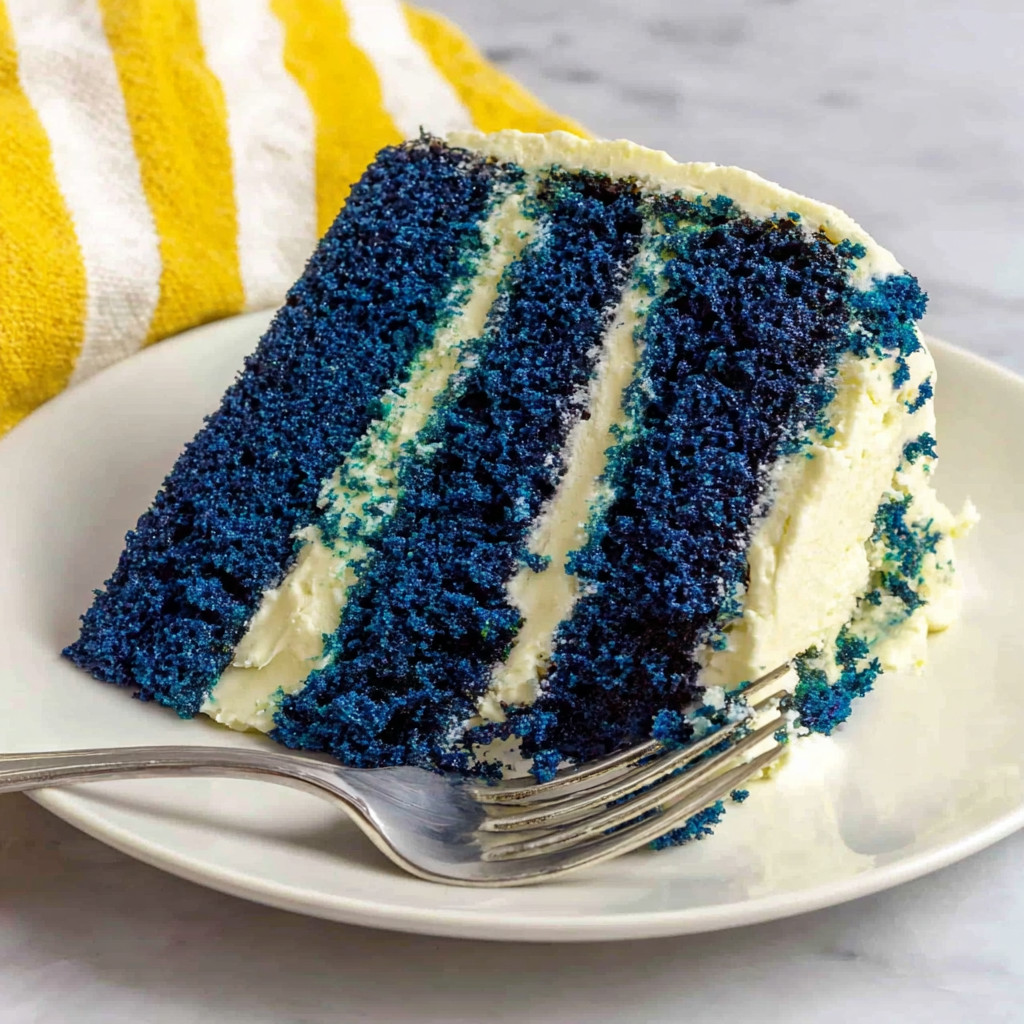 A slice of blue velvet vanilla pound cake.