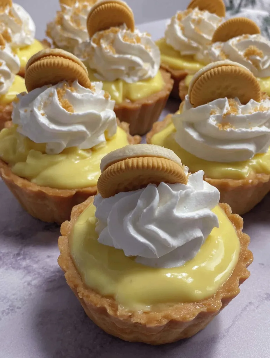 Banana cream pies in a muffin tin.