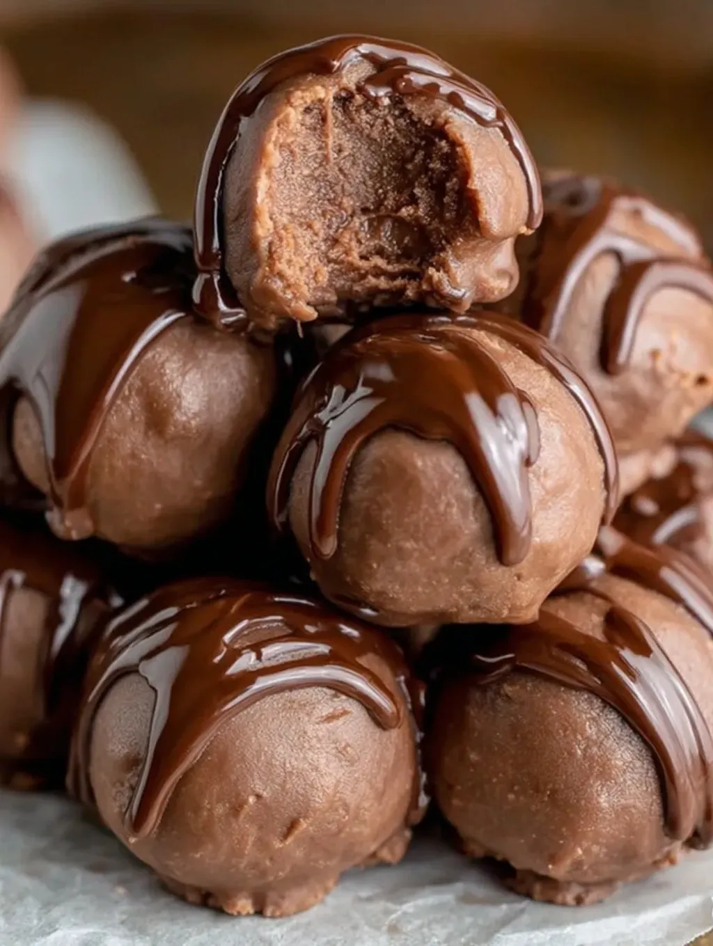 Chocolate covered cottage cheese bites.