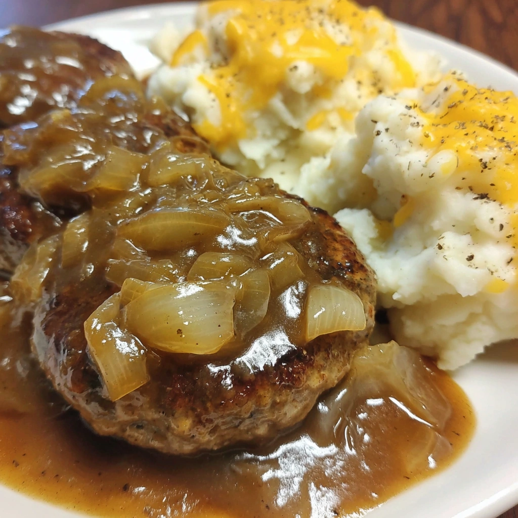 Hamburger steaks with onion gravy.