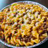 A bowl of macaroni and cheese.